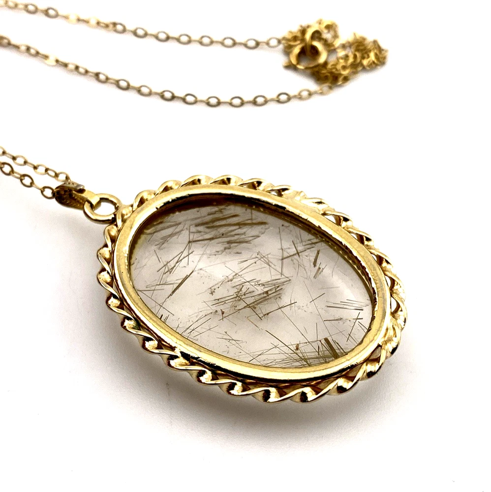 Gold rutilated quartz pendant necklace with oval cabochon and 12k rolled gold chain
8) Short Description