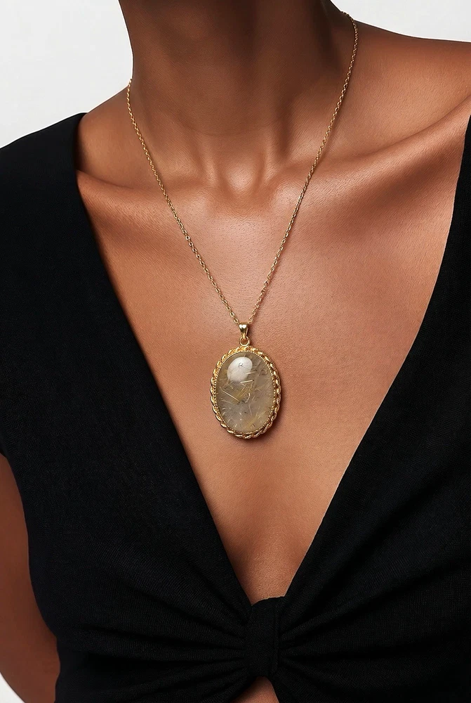 Gold rutilated quartz pendant necklace with oval cabochon and 12k rolled gold chain
8) Short Description