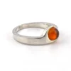 Vintage Modernist sterling silver ring with a round honey colored Baltic amber cabochon.
