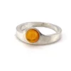 Vintage Modernist sterling silver ring with a round honey colored Baltic amber cabochon.