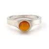 Vintage Modernist sterling silver ring with a round honey colored Baltic amber cabochon.