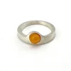 Vintage Modernist sterling silver ring with a round honey colored Baltic amber cabochon.