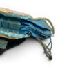 Antique Art Nouveau era mother-of-pearl and blue silk necessaire purse with scalloped shell panels, rope handles, and tassel.