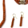 Deatil on filigree box clasp for tube coral three strand bracelet.