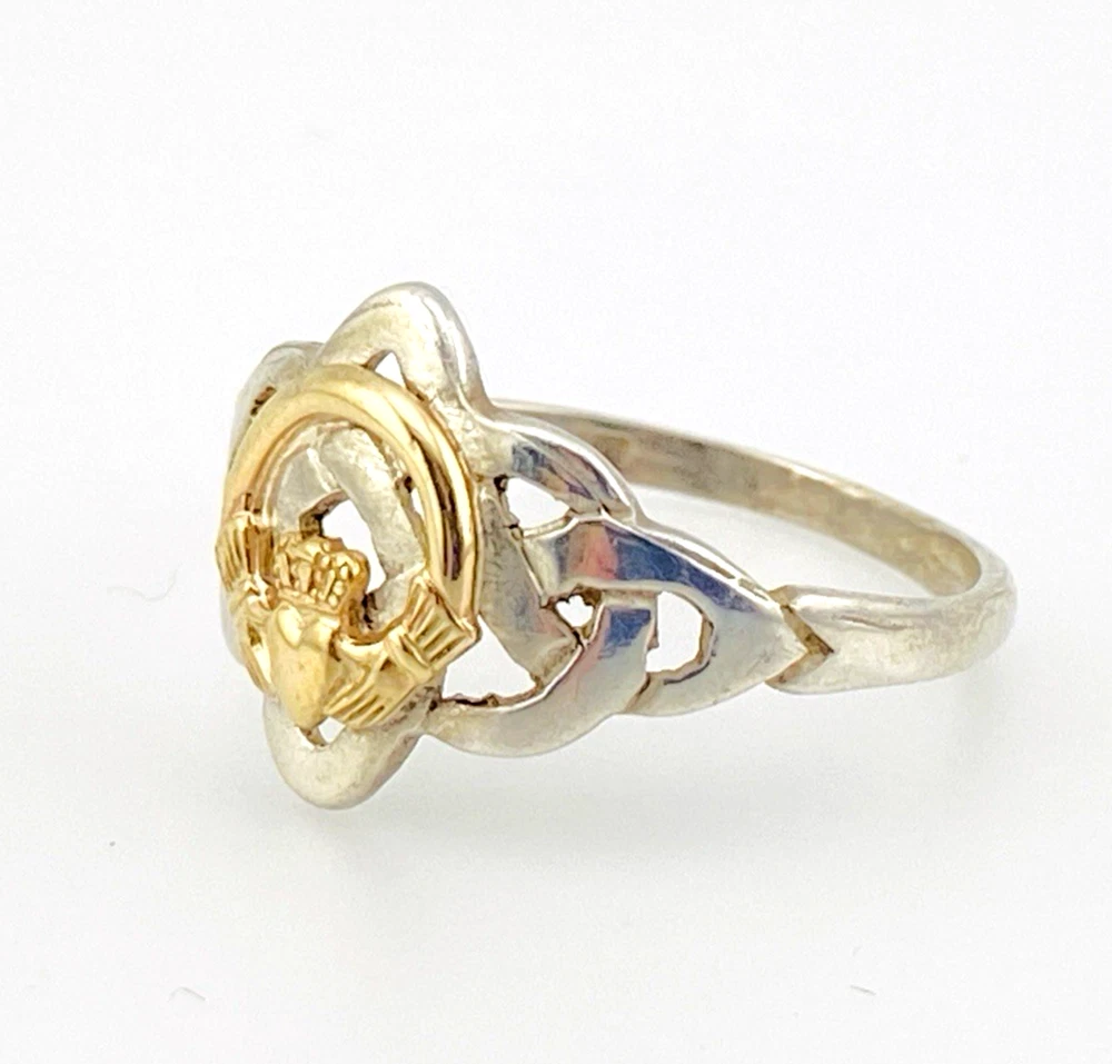 Vintage sterling silver and estimated 8k gold Claddagh ring with crowned heart and Celtic openwork shoulders