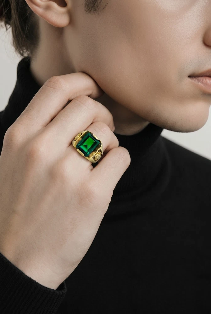 Vintage Mexican biker brass ring with green faceted glass stone and Our Lady of Guadalupe shoulders