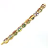 Vintage Canada souvenir bracelet with colorful enameled provincial shield links and gold plated finish