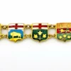 Vintage Canada souvenir bracelet with colorful enameled provincial shield links and gold plated finish