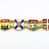 Vintage Canada souvenir bracelet with colorful enameled provincial shield links and gold plated finish