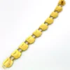 Vintage Canada souvenir bracelet with colorful enameled provincial shield links and gold plated finish