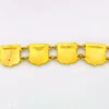 Vintage Canada souvenir bracelet with colorful enameled provincial shield links and gold plated finish