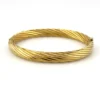 Vintage Carl Art 14k gold filled twisted rope hinged bangle bracelet with oval hollow form