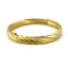 Vintage Carl Art 14k gold filled twisted rope hinged bangle bracelet with oval hollow form