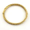 Vintage Carl Art 14k gold filled twisted rope hinged bangle bracelet with oval hollow form