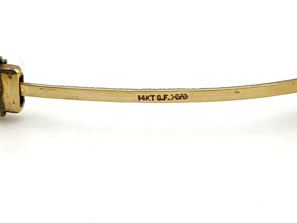 Vintage Carl Art 14k gold filled twisted rope hinged bangle bracelet with oval hollow form
