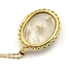 Gold rutilated quartz pendant necklace with oval cabochon and 12k rolled gold chain

8) Short Description