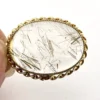 Gold rutilated quartz pendant necklace with oval cabochon and 12k rolled gold chain

8) Short Description