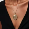 Gold rutilated quartz pendant necklace with oval cabochon and 12k rolled gold chain

8) Short Description