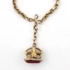 Gold filled repurposed pocket watch chain necklace with pink jeweled fob charm and mixed chain links