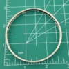 Vintage Beau Sterling silver bangle bracelet with stamped geometric pattern.