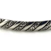 Vintage Danecraft sterling silver bangle bracelet with raised spiral rope design and carved scroll details.