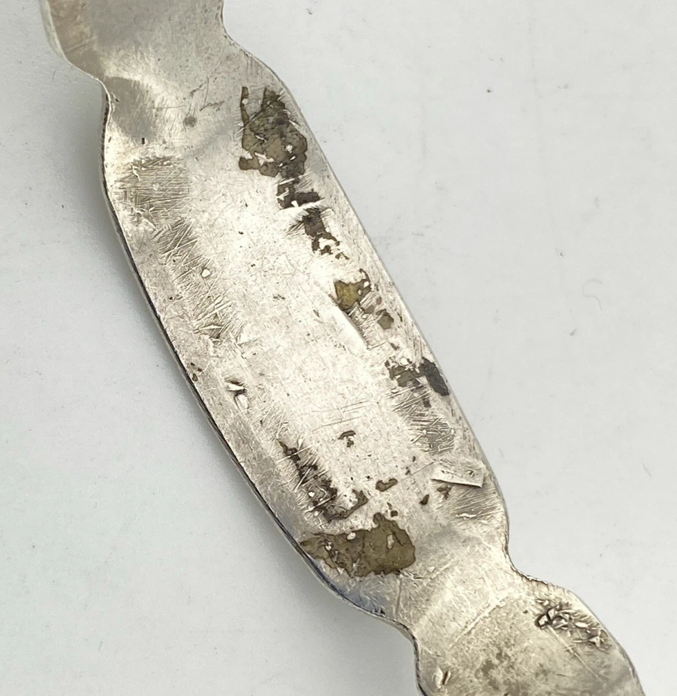 Vintage 1920s–1930s Navajo Fred Harvey era silver cuff bracelet with applied arrows, hand stamped motifs, and lizard-like markings.