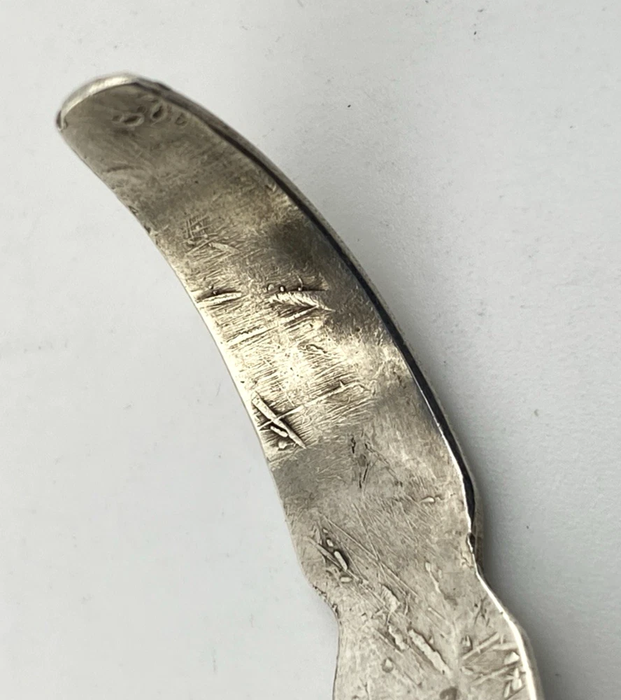 Vintage 1920s–1930s Navajo Fred Harvey era silver cuff bracelet with applied arrows, hand stamped motifs, and lizard-like markings.