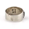 Vintage Southwestern sterling silver cigar band ring with turquoise, coral, black onyx, and mother of pearl inlay.