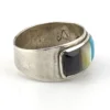 Vintage Southwestern sterling silver cigar band ring with turquoise, coral, black onyx, and mother of pearl inlay.