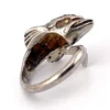 Vintage sterling silver dolphin bypass ring with carved figural details and dark patina.