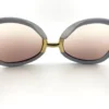 Brown gradient lenses on gray Ted Lapidus sunglasses