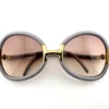 Ted Lapidus vintage sunglasses front view with arms crossed