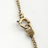 Tiny antique Victorian round initial D locket necklace with chased cover and 1/10 14K gold filled tight curb chain