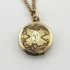 Tiny antique Victorian round initial D locket necklace with chased cover and 1/10 14K gold filled tight curb chain