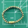 Vintage child’s size 1/20 12K gold filled Bellavance expansion bracelet with engraved heart centerpiece and raised floral links
