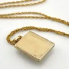 Vintage H.F.B. 1/20 12K gold filled book locket necklace with Valley Forge Military Academy seal on white mother of pearl and 17.5 inch rope chain