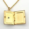 Vintage H.F.B. 1/20 12K gold filled book locket necklace with Valley Forge Military Academy seal on white mother of pearl and 17.5 inch rope chain