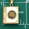 Vintage H.F.B. 1/20 12K gold filled book locket necklace with Valley Forge Military Academy seal on white mother of pearl and 17.5 inch rope chain