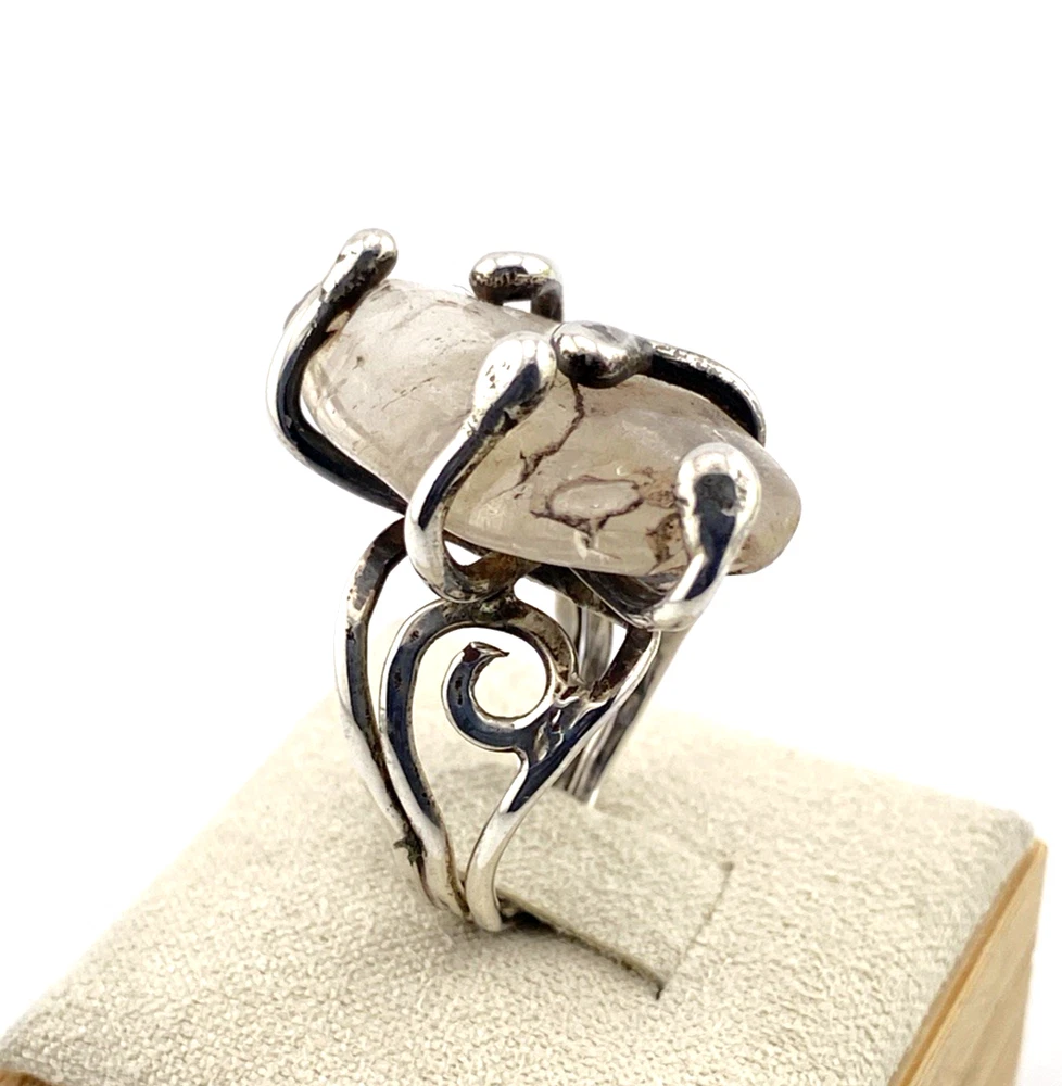Vintage Modernist Brutalist sterling silver studio ring with a large tumbled amethyst pebble and hand wrought scroll setting.