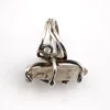 Vintage Modernist Brutalist sterling silver studio ring with a large tumbled amethyst pebble and hand wrought scroll setting.