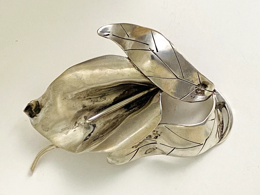 Vintage Modernist sterling silver calla lily brooch signed PA Reg with dimensional handmade leaves and heavy patina.