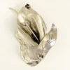 Vintage Modernist sterling silver calla lily brooch signed PA Reg with dimensional handmade leaves and heavy patina.