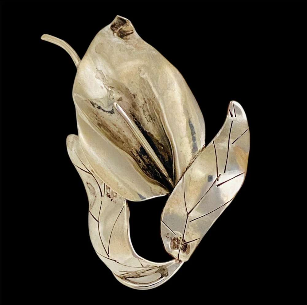 Vintage Modernist sterling silver calla lily brooch signed PA Reg with dimensional handmade leaves and heavy patina.