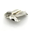 Vintage Modernist sterling silver calla lily brooch signed PA Reg with dimensional handmade leaves and heavy patina.