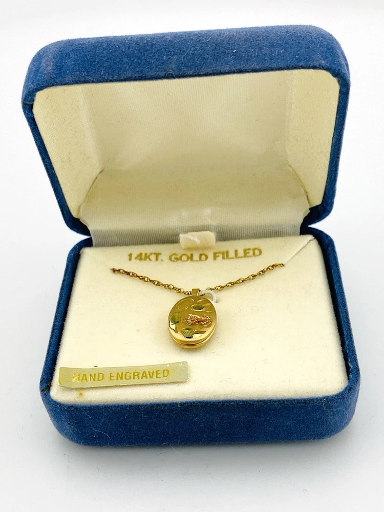 Vintage new old stock PPC 14K gold filled engraved oval locket necklace in original blue box with sealed 18 inch chain