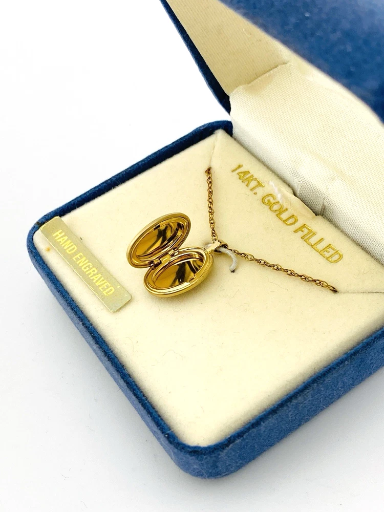 Vintage new old stock PPC 14K gold filled engraved oval locket necklace in original blue box with sealed 18 inch chain
