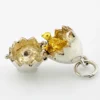 Vintage sterling silver hinged egg pendant charm that opens to reveal a gold vermeil chick inside.