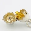Vintage sterling silver hinged egg pendant charm that opens to reveal a gold vermeil chick inside.
