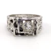 Vintage Uncas men’s Modernist white gold plated ring with open shoulders and a round faceted crystal.