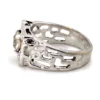 Vintage Uncas men’s Modernist white gold plated ring with open shoulders and a round faceted crystal.